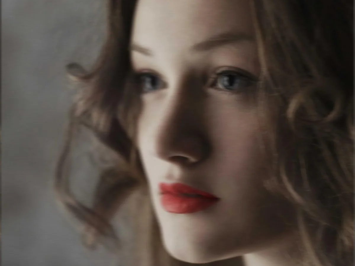Motion-blurred portrait restored before